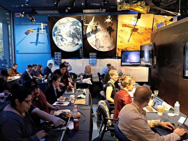 Journalists gather at NASA's Jet Propulsion Laboratory awaiting the landing of InSight on Mars Monday, Nov. 26, 2018, in Pasadena, Calif . A NASA spacecraft is just a few hours away from landing on Mars. The InSight lander is aiming for a Monday afternoon touchdown on what scientists and engineers …
