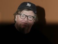 MichaelmooreGM1 Michael Moore poses for photographers during a photo call of the movie "Fahrenheit 11/9" at the 13th edition of the Rome Film Fest, in Rome, Saturday, Oct. 20, 2018. (AP Photo/Gregorio Borgia)