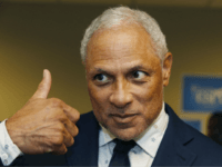 In this Friday, Sept. 7, 2018 photo, Mike Espy, a Democrat and former President Bill Clinton's first agriculture secretary, gives a thumbs up sign of approval at the Jackson, Miss., opening of his campaign headquarters, as to the direction of his campaign for November's special election to fill the unexpired …