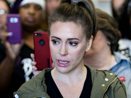 Actress Alyssa Milano gathers with other activists in the office of Senator Susan M. Collins (R-ME) during protests against Judge Brett Kavanaugh on Capitol Hill September 26, 2018 in Washington, DC. - The US Senate Judiciary Committee has scheduled for Friday a preliminary vote on the nomination of Supreme Court …