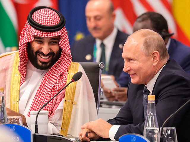 Russia's President Vladimir Putin (R) and Saudi Arabia's Crown Prince Mohammed bin Salman attend the G20 Leaders' Summit in Buenos Aires, on November 30, 2018. - Global leaders gather in the Argentine capital for a two-day G20 summit beginning on Friday likely to be dominated by simmering international tensions over …