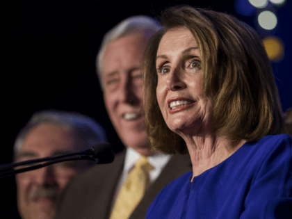 House Minority Leader Nancy Pelosi (D-CA), joined by House Democrats, delivers remarks during a DCCC election watch party at the Hyatt Regency on November 6, 2018 in Washington, DC. (Photo by Zach Gibson/Getty Images)