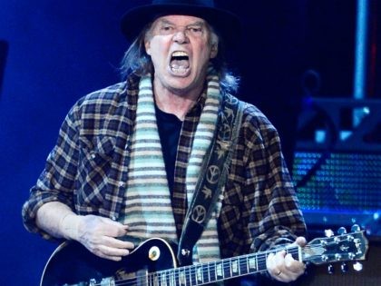 LOS ANGELES, CA - FEBRUARY 08: Singer Neil Young performs onstage at The 2013 MusiCares Person Of The Year Gala Honoring Bruce Springsteen at Los Angeles Convention Center on February 8, 2013 in Los Angeles, California. (Photo by Kevork Djansezian/Getty Images)