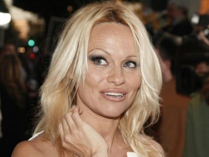LOS ANGELES - MARCH 27: Actress Pamela Anderson arrives at the premiere of Dimension Film's 'Superhero Movie' at the Mann Festival Westwood on March 27, 2008 in Los Angeles, California. (Photo by Kevin Winter/Getty Images)