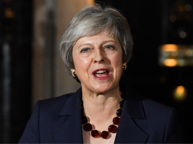 Britain's Prime Minister Theresa May gives a statement outside 10 Downing Street in London on November 14, 2018, after holding a cabinet meeting where ministers were expected to either back the draft bexit deal or quit. - British Prime Minister Theresa May defended her anguished draft divorce deal with the …