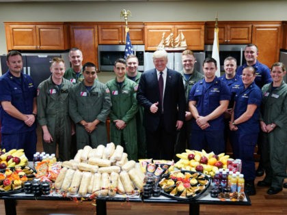US President Donald Trump poses as he visits with personnel at US Coast Guard Station Lake Worth Inlet in Riviera Beach, Florida, on Thanksgiving Day, November 22, 2018. (Photo by MANDEL NGAN / AFP) (Photo credit should read MANDEL NGAN/AFP/Getty Images)