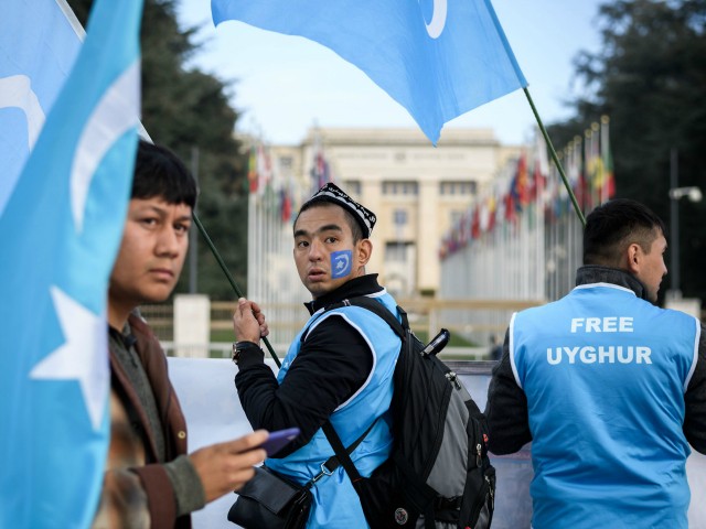 Uyghurs people demonstrate against China outside of the United Nations (UN) offices during the Universal Periodic Review of China by the UN Human Rights Council, on November 6, 2018 in Geneva. - China's mass detainment of ethnic Uighurs and its crackdown on civil liberties likely figures high on the agenda when countries meet at the UN in Geneva to review Beijing's rights record. (Photo by Fabrice COFFRINI / AFP) (Photo credit should read FABRICE COFFRINI/AFP/Getty Images)