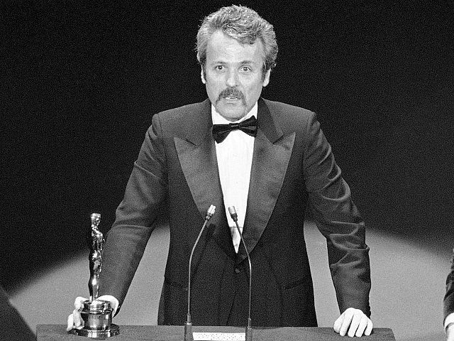 FILE - In this March 28, 1977 file photo, William Goldman accepts his Oscar at Academy Awa