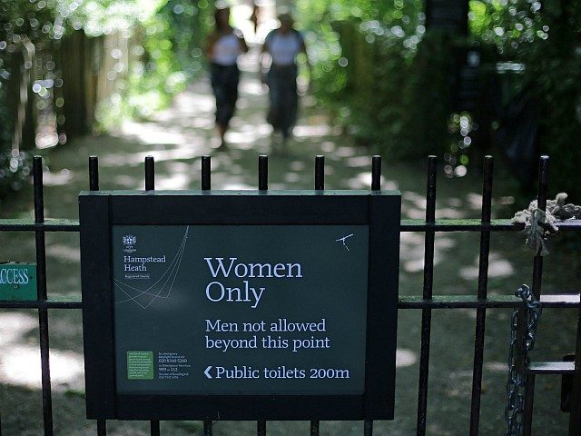 The sign indicating the 'Women Only' swimming pool is seen attached to gates on Hampstead