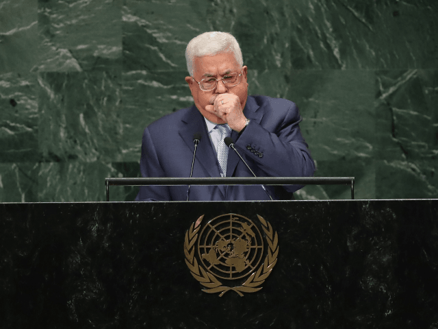 Palestinian President Mahmoud Abbas coughs during his address at the United Nations General Assembly on September 27, 2018 in New York City. World leaders gathered for the 73rd annual meeting at the UN headquarters in Manhattan. (Photo by John Moore/Getty Images)