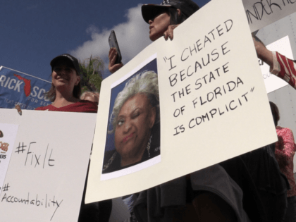 Approximately 60 protesters gathered outside Broward Supervisor of Elections Brenda Snipes' office, chanting 'lock her up,' and 'Brenda's got to go!' as the canvassing board was preparing to meet, Friday, Nov. 9, 2018.