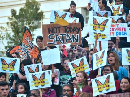 Dreamers and advocates attend a rally in support of a Clean Dream Act in Los Angeles, California on March 5, 2018, the deadline for DACA recipients from the Trump administration that went into motion six months ago. / AFP PHOTO / Frederic J. BROWN (Photo credit should read FREDERIC J. …