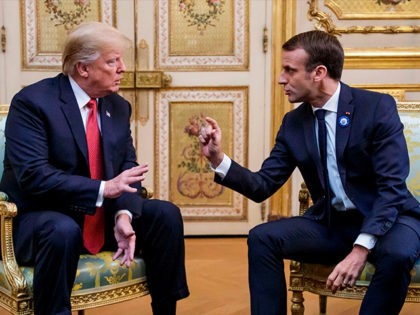 US President Donald Trump (L) speaks s with French president Emmanuel Macron prior to their meeting at the Elysee Palace in Paris, on November 10, 2018, on the sidelines of commemorations marking the 100th anniversary of the 11 November 1918 armistice, ending World War I. (Photo by Christophe Petit-Tesson / …