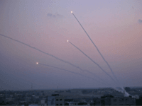 A picture taken from the Gaza Strip on November 12, 2018 shows missiles being launched toward Israel. - A number of rockets were launched from the Gaza Strip toward Israel today, AFP journalists said, while Israel's army said an Israeli bus was hit by fire from the Palestinian enclave. (Photo …