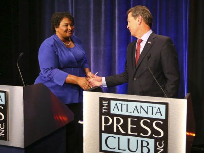 Democrat candidate for Georgia Governor Stacey Abrams, left, and Republican Secretary of S