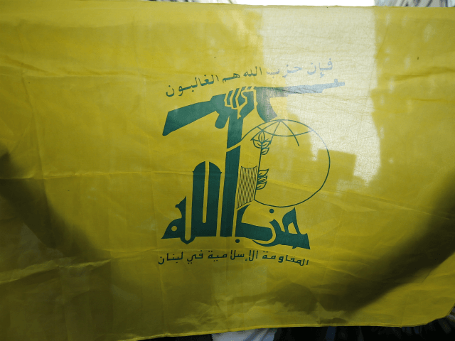 A protester holding a flag of Lebanon's Hezbollah militant group marches during a demonstration in Istanbul, Tuesday, May 15, 2018. Hundreds of demonstrators gathered in in Istanbul to protest the U.S.' decision to relocate its embassy to Jerusalem and to condemn the death of dozens of Palestinians killed Monday by …