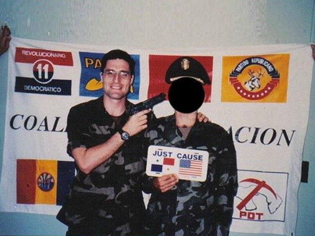 A photo emerged showing Democrat Congressional candidate George Scott (PA-10) pointing a gun at an American soldier in what was allegedly supposed to be a prank about handling captives.