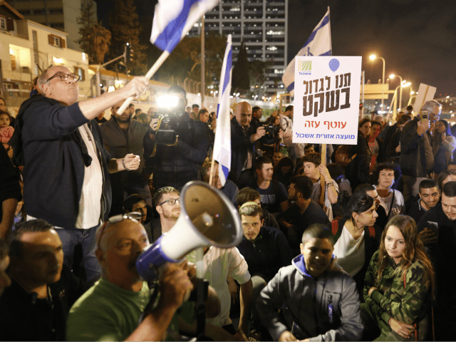 Israelis protest against a recent cease fire with the Hamas movement, in the coastal city