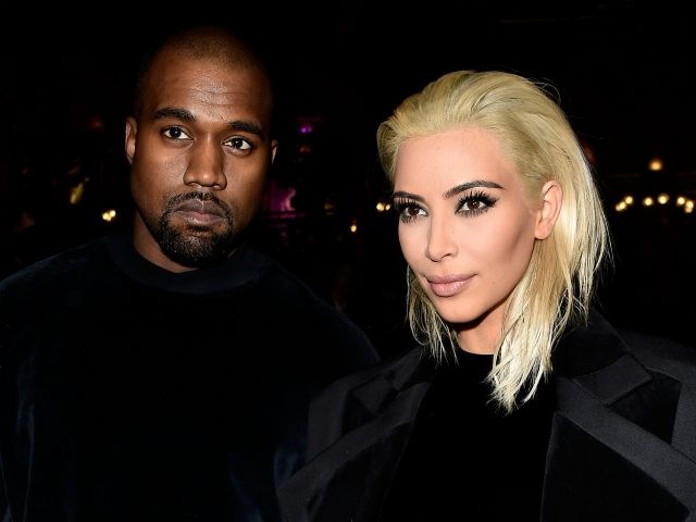 PARIS, FRANCE - MARCH 05: Kim Kardashian and Kanye West attend the Balmain show as part of the Paris Fashion Week Womenswear Fall/Winter 2015/2016 on March 5, 2015 in Paris, France. (Photo by Pascal Le Segretain/Getty Images)
