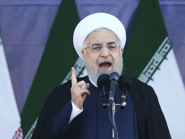 Iran's President Hassan Rouhani speaks at a military parade marking the 38th anniversary o