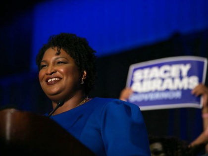 ATLANTA, GA - MAY 22: Georgia Democratic Gubernatorial candidate Stacey Abrams takes the stage to declare victory in the primary during an election night event on May 22, 2018 in Atlanta, Georgia. If elected, Abrams would become the first African American female governor in the nation. (Photo by Jessica McGowan/Getty …