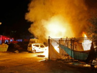 terror rocket attack israel Israeli security forces and firefighters gather near abuilding set ablaze after it was hit by a rocket fired from the Palestinian enclave, in the southern Israeli town of Sderot on November 12, 2018. - Israel's military said it was carrying out air strikes 'throughout the Gaza Strip' on Monday after …