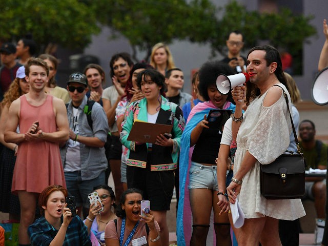 Members of the Transgender community and their supporters hold a rally and march to City H