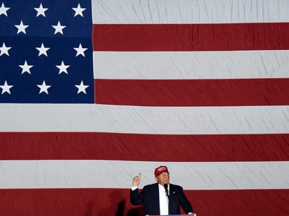 TOPSHOT - Republican presidential candidate Donald Trump speaks at a rally on March 13, 2016 in Boca Raton, Florida. Primary voters head to the polls on March 15th in Florida. / AFP / RHONA WISE (Photo credit should read RHONA WISE/AFP/Getty Images)