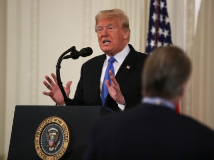 U.S. President Donald Trump takes questions after giving remarks gives remarks a day after