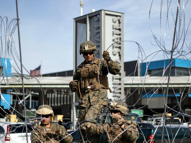 US Department of Defence personnel install barriers requested by Custom and Border Protection at the San Ysidro port of entry, San Diego, US, under the Operation Secure Line anticipating the arrival of Central American migrants heading towards the border, as seen from the Mexican side of the border in Tijuana, …