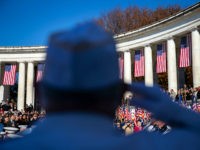 ARLINGTON, VA - NOVEMBER 11: A veteran salutes as the Honor Guard arrives during a Veterans Day ceremony at Arlington National Cemetery, on November 11, 2018 in Arlington, Virginia. (Photo by Al Drago/Getty Images)
