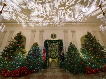 The Grand Foyer and Cross Hall leading into the Blue Room and the official White House Chr