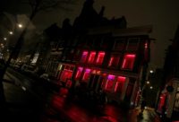 City authorities are debating a plan to give sex workers licences to work outside the red light area in Amsterdam