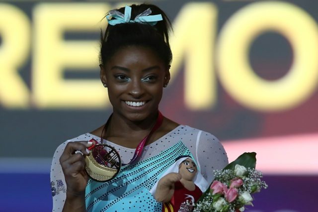 Simone Biles claims record 13th world gold medal