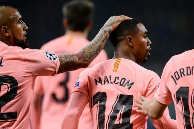 Barcelona through in Champions League as Liverpool suffer shock loss