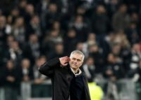 Manchester United's Jose Mourinho gestures towards the Juventus fans