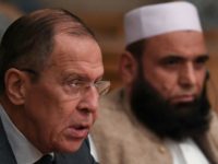 This is the first time that a Taliban delegation is taking part in such high-level international talks, the office of Russia's Foreign Minister Sergei Lavrov (L) said