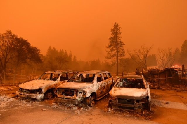 Nine die in California wildfires, tens of thousands forced to flee