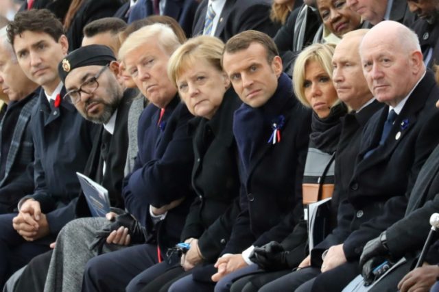Trump, Putin absent for leaders' symbolic walk in Paris rain