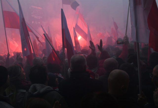 Poland holds centenary parade alongside far-right march