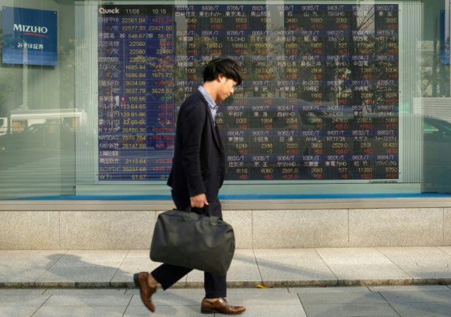 Asian markets start week on cautious note
