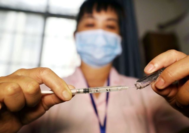 China mulls $720,000 fine for faking vaccine tests after scandal