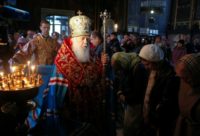 The Orthodox church in Ukraine is divided between a branch whose clerics pledge loyalty to Moscow and one overseen by the Kiev-based Patriarch Filaret (C) that Russia does not recognise