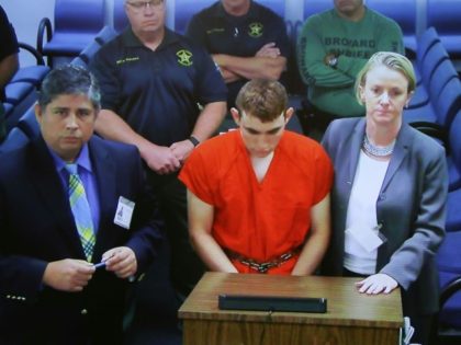 Florida school shooter accused of assaulting guard