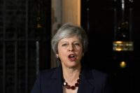Britain's Prime Minister Theresa May conceded there were "difficult days ahead" as she seeks to woo MPs over her Brexit deal