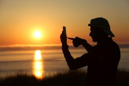 EU to curb phone costs, set up emergency alert system