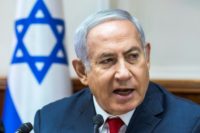 Israeli Prime Minister Benjamin Netanyahu speaks during the weekly cabinet meeting at his office in Jerusalem on August 12, 2018