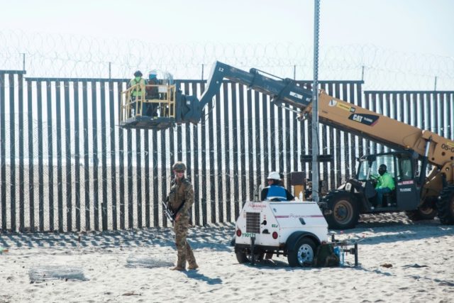 Trump says troops to remain at border 'as long as necessary'