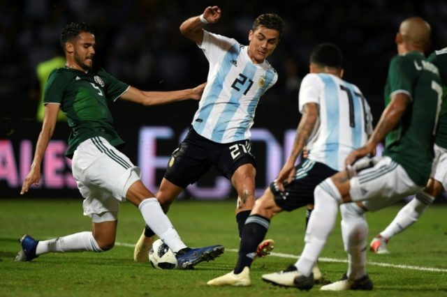 Dybala shines as Argentina ease past Mexico