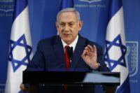 Israeli Prime Minister Benjamin Netanyahu speaks in a televised address to the nation in the coastal city of Tel Aviv on November 18, 2018